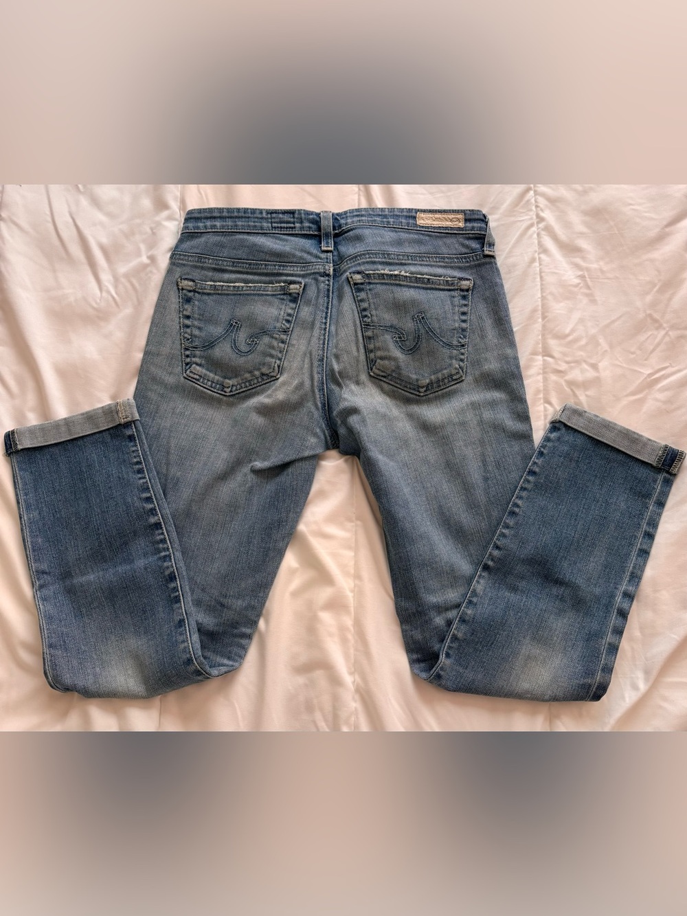 Ag Adriano Goldschmied Light Blue Denim Jeans with Subtle Distressing